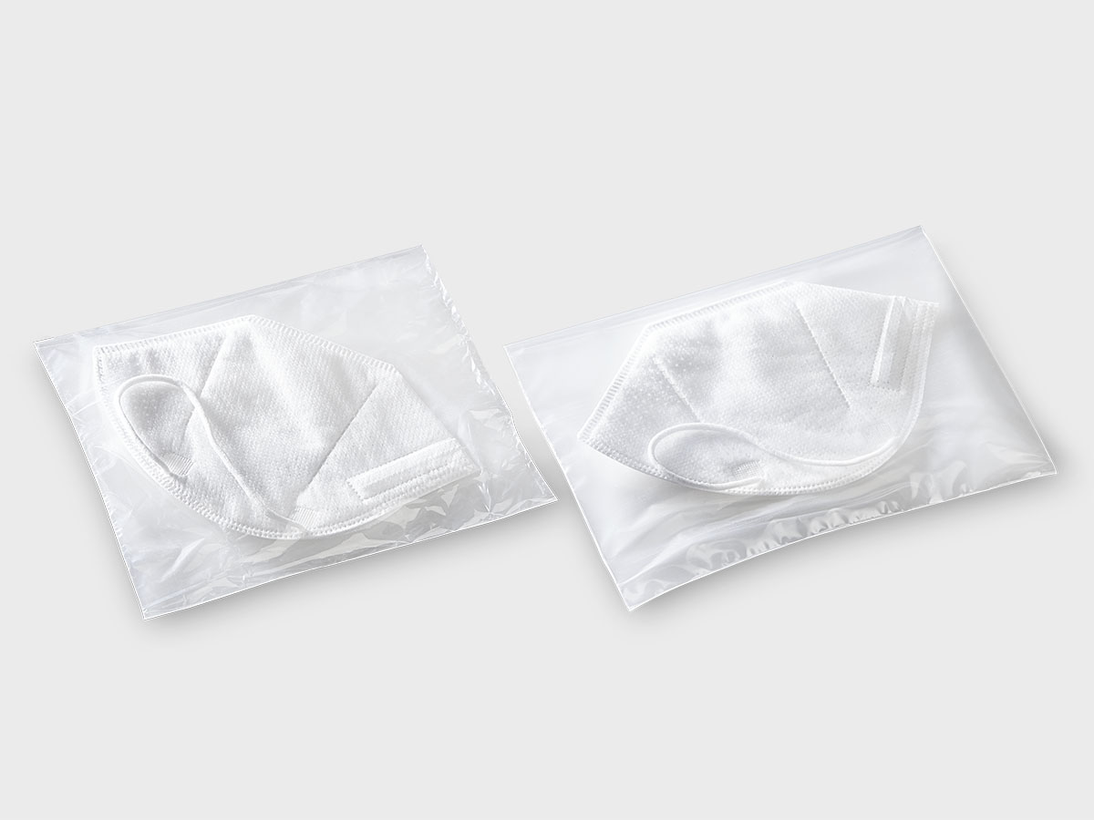 Schutzmasken in transparenter Folienverpackung