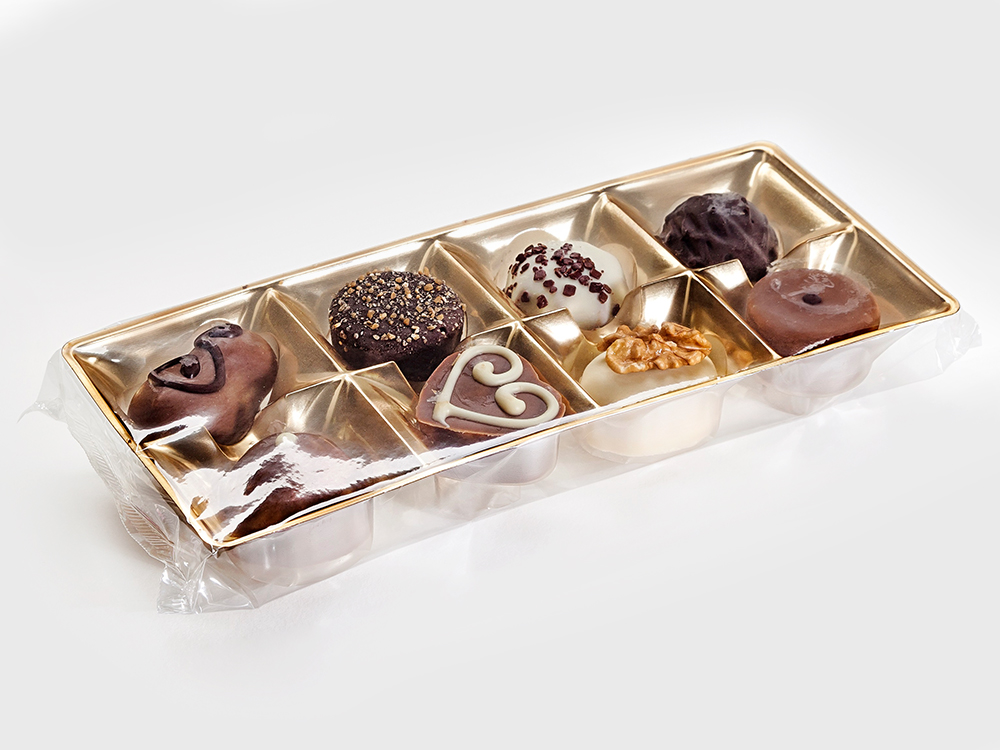 Abbildung von Flowpack-Verpackung für Pralinen